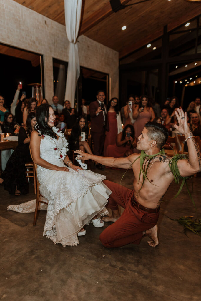 shirtless groom dancing for the bride