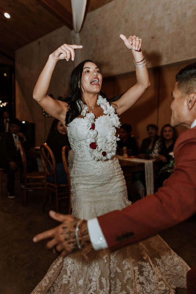 bride dancing at the red earth venue