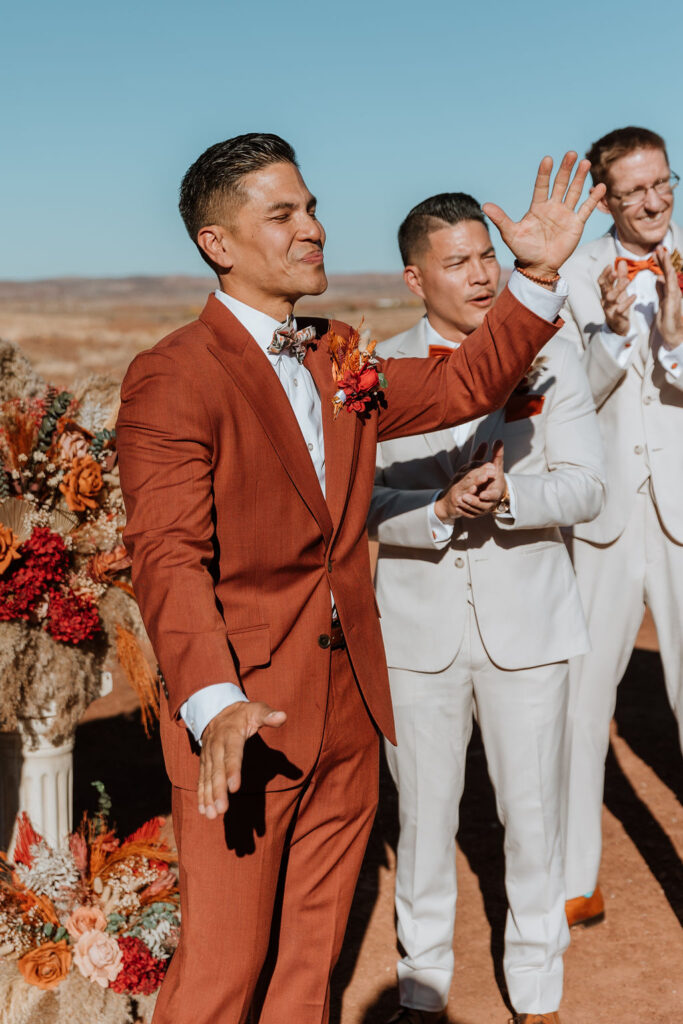 the groom at the red earth venue in moab utah