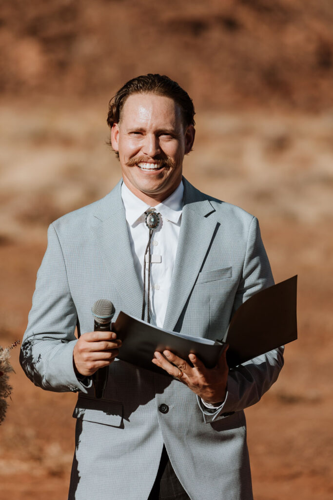The officiant at a desert wedding