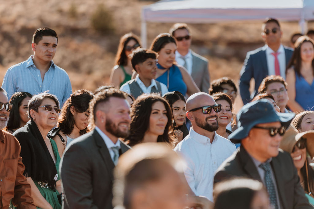 guests at the ceremony at the red earth venue in moab utah