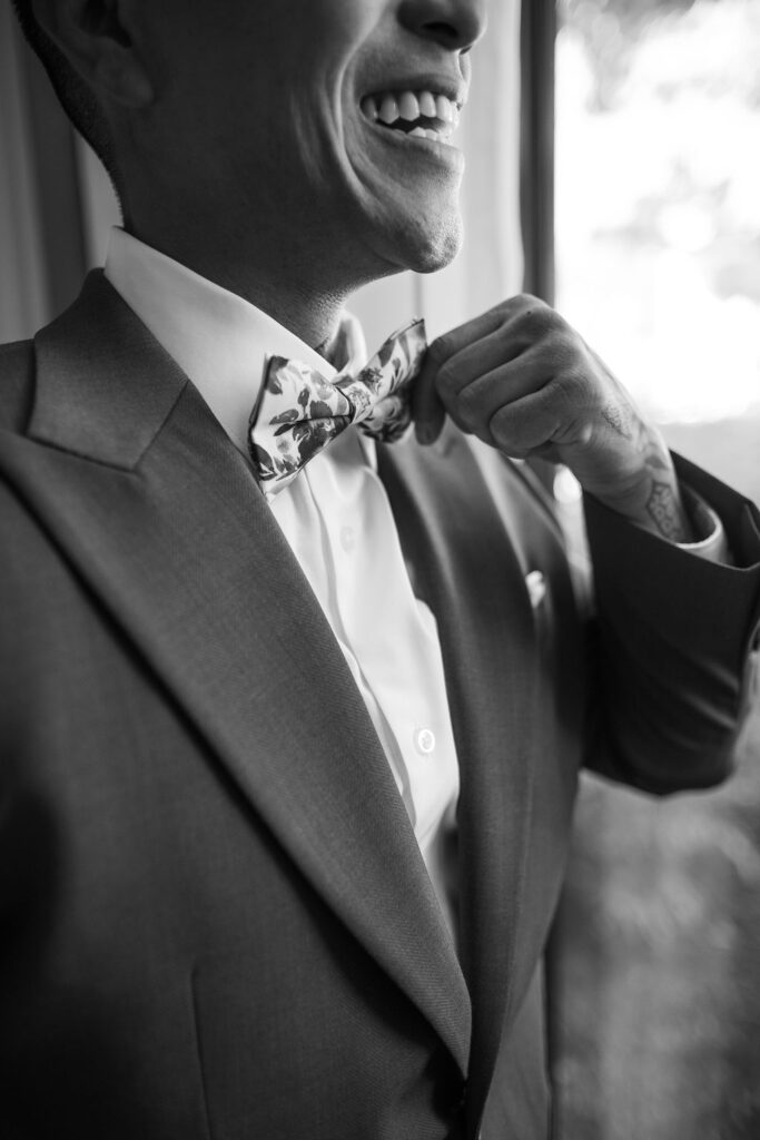 black and white groom close up