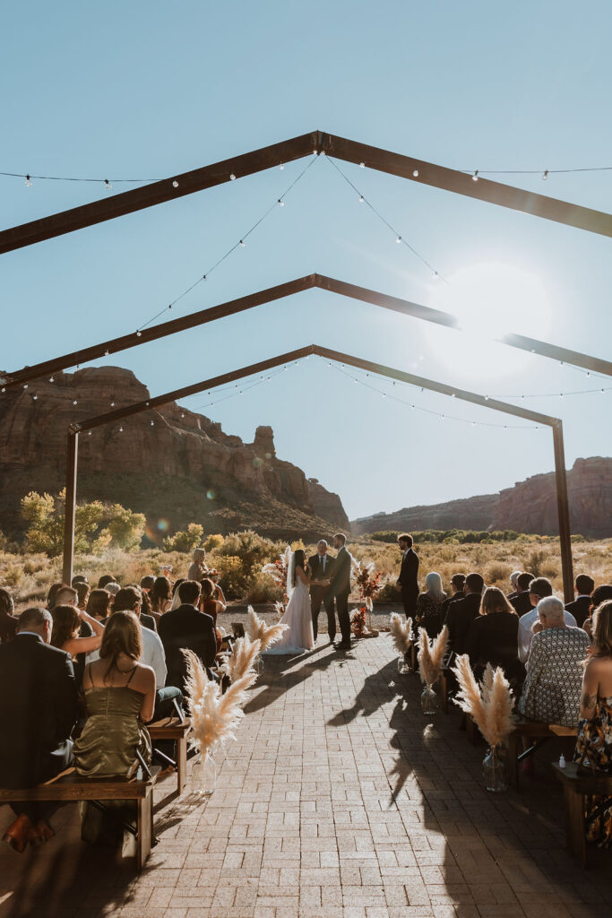 couple exchanges vows at The Red Earth Venue in Moab