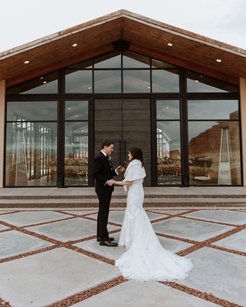 couple exchanges vows at The Red Earth Venue