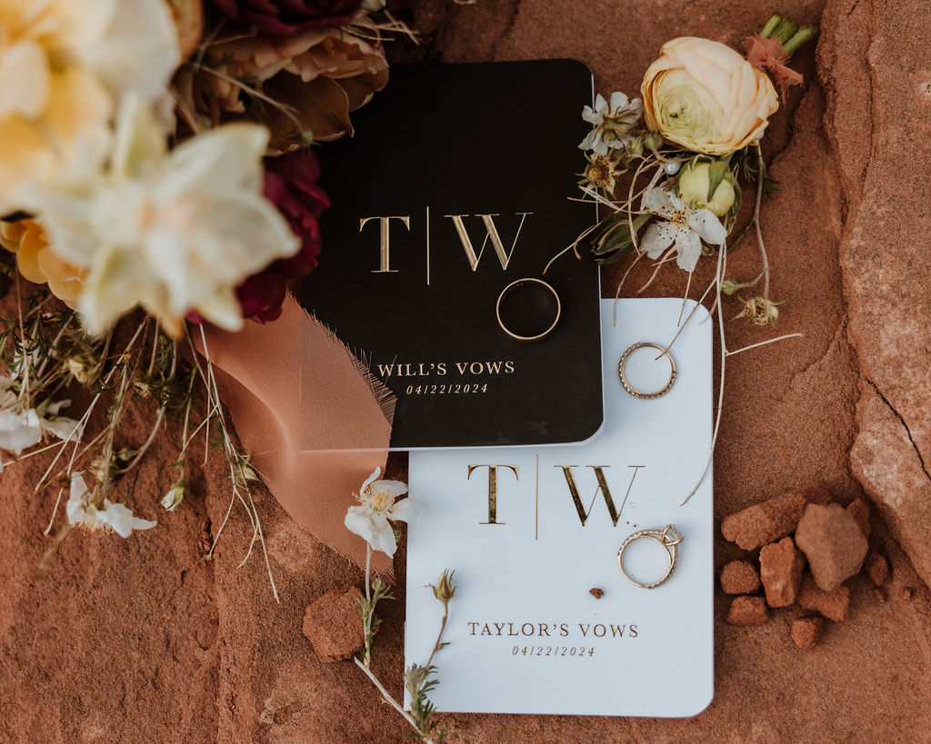 flowers, rings and vow book wedding details