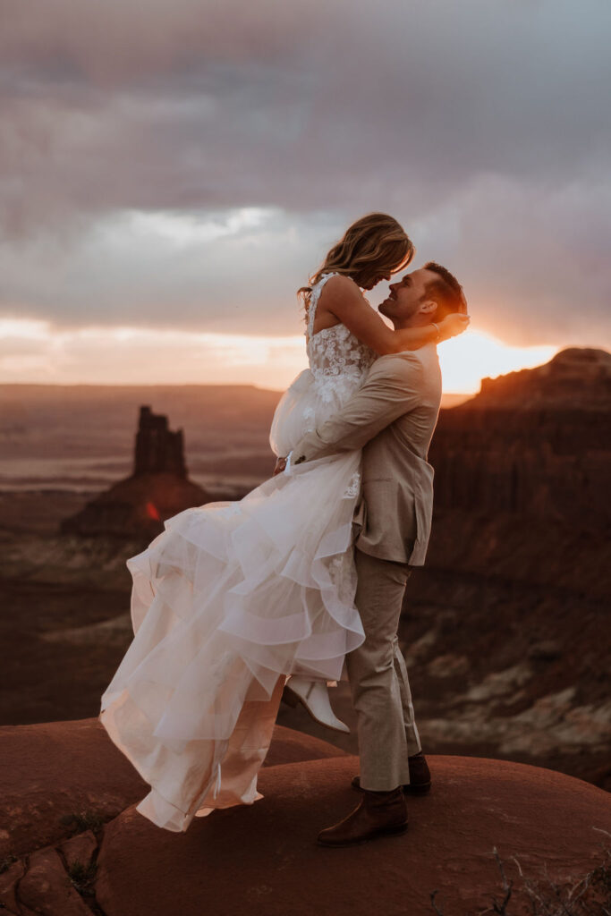 couple embraces at at Green River Overlook elopement