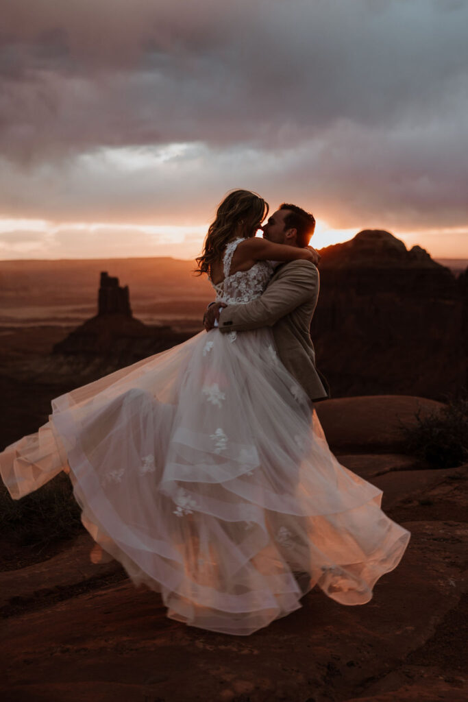 couple embraces at at Green River Overlook elopement