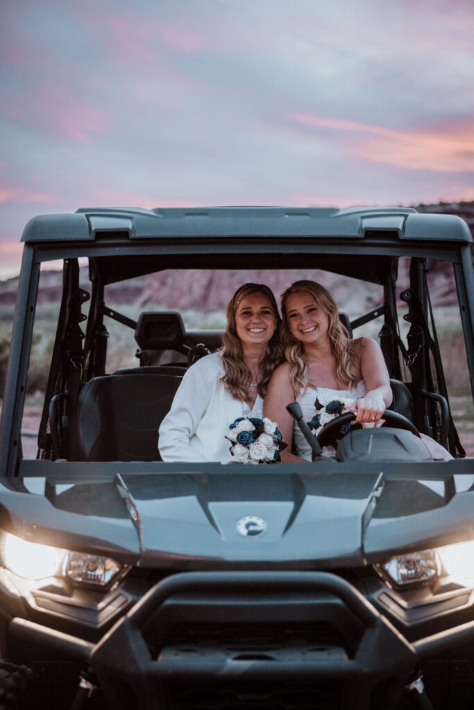couple drives in go cart at wedding venue