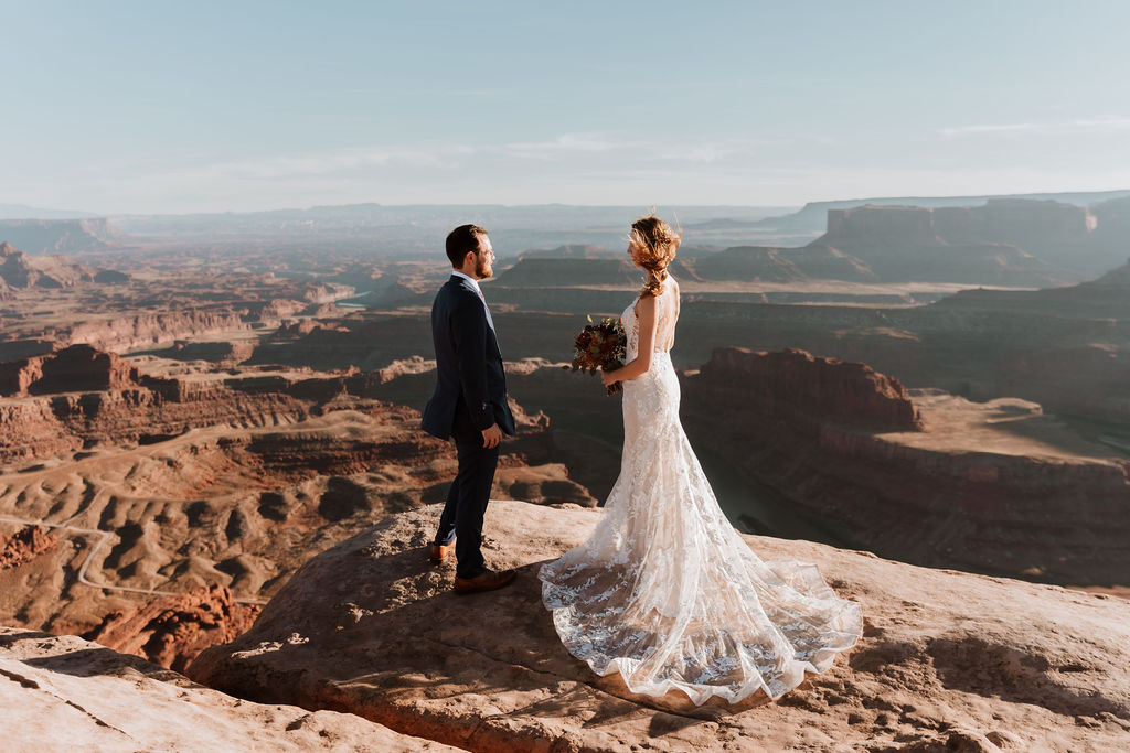 couple exchanges vows at Dead Horse Point State Park Moab elopement 