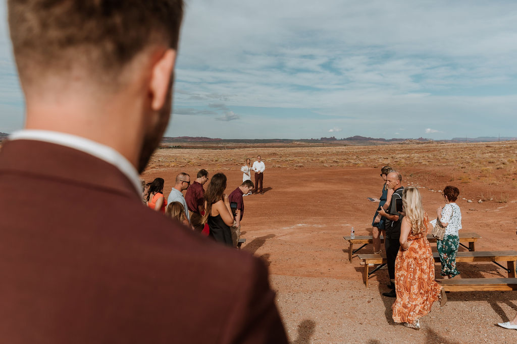 guests watch bride at The Red Earth Venue