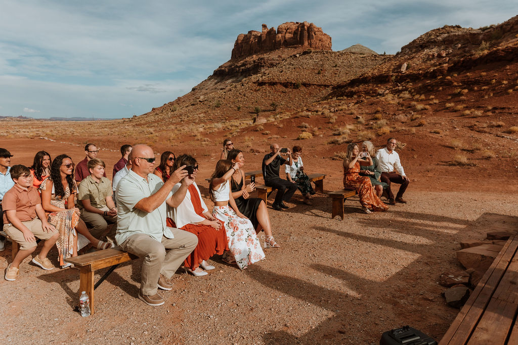 guests watch ceremony at The Red Earth Venue