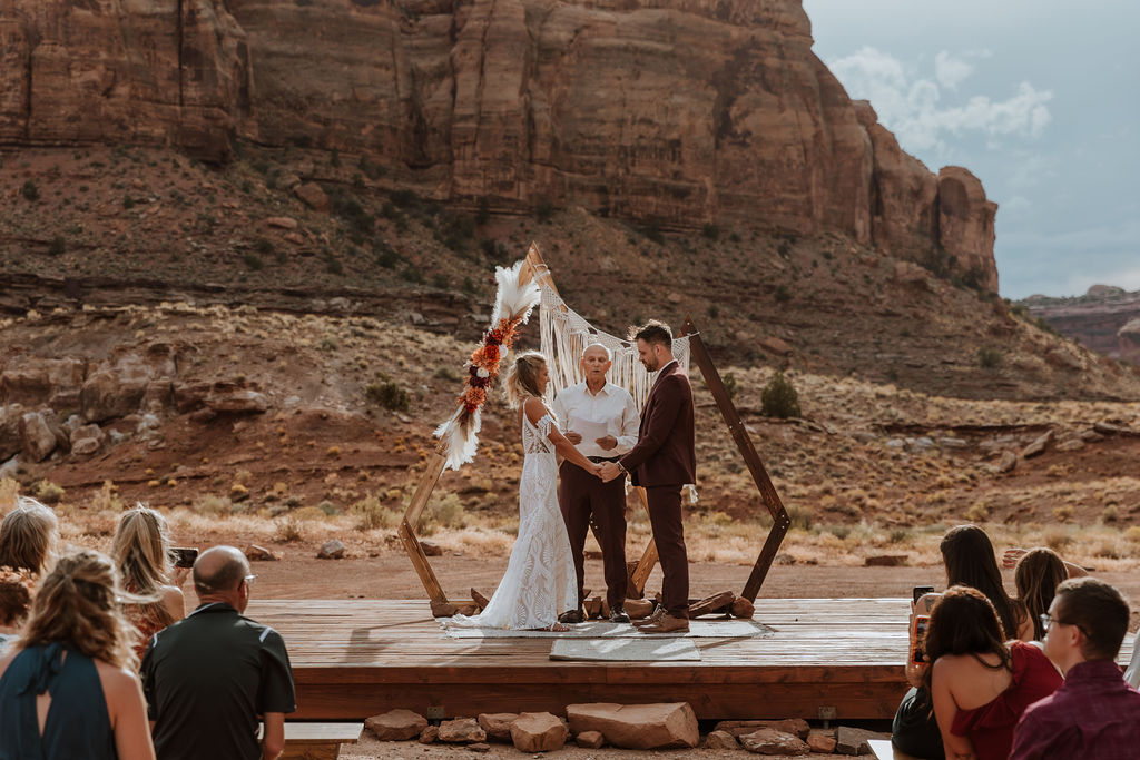 couple exchanges vows at The Red Earth Venue wedding