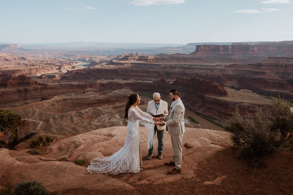 couple exchanges vows at Dead Horse Point State Park Moab elopement