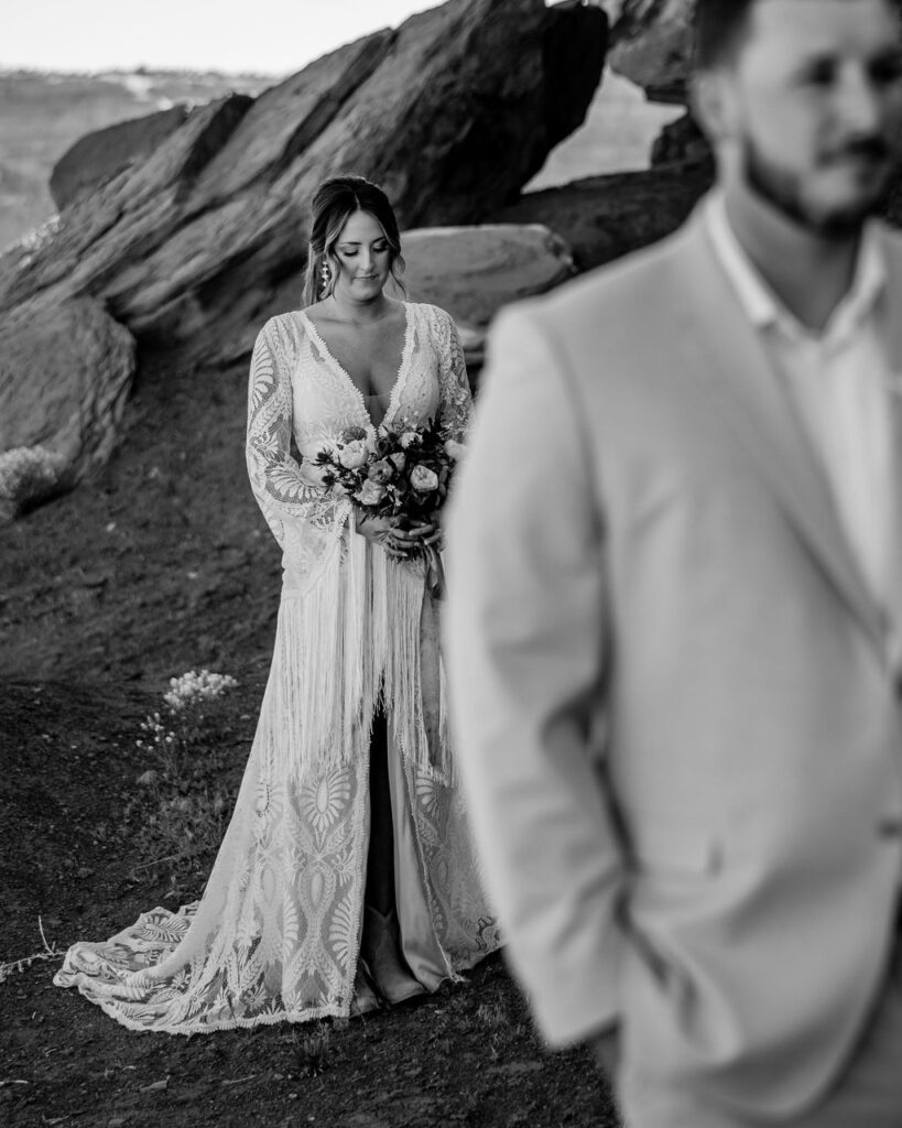 bride approaches groom during wedding first look