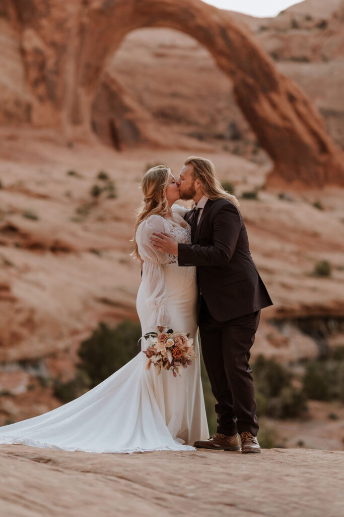 couple kisses at at Bureau Land Management land