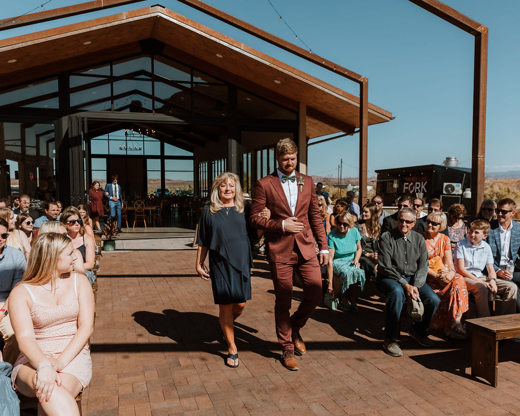 bridal party walks down aisle at The Red Earth Venue wedding