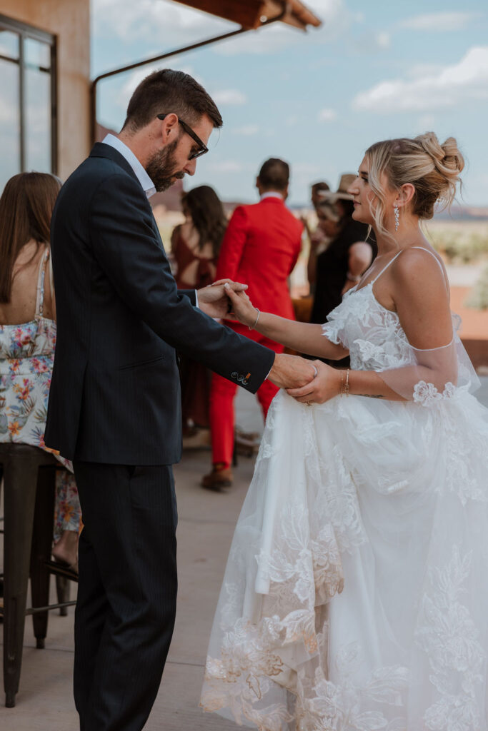 couple dances at wedding cocktail hour