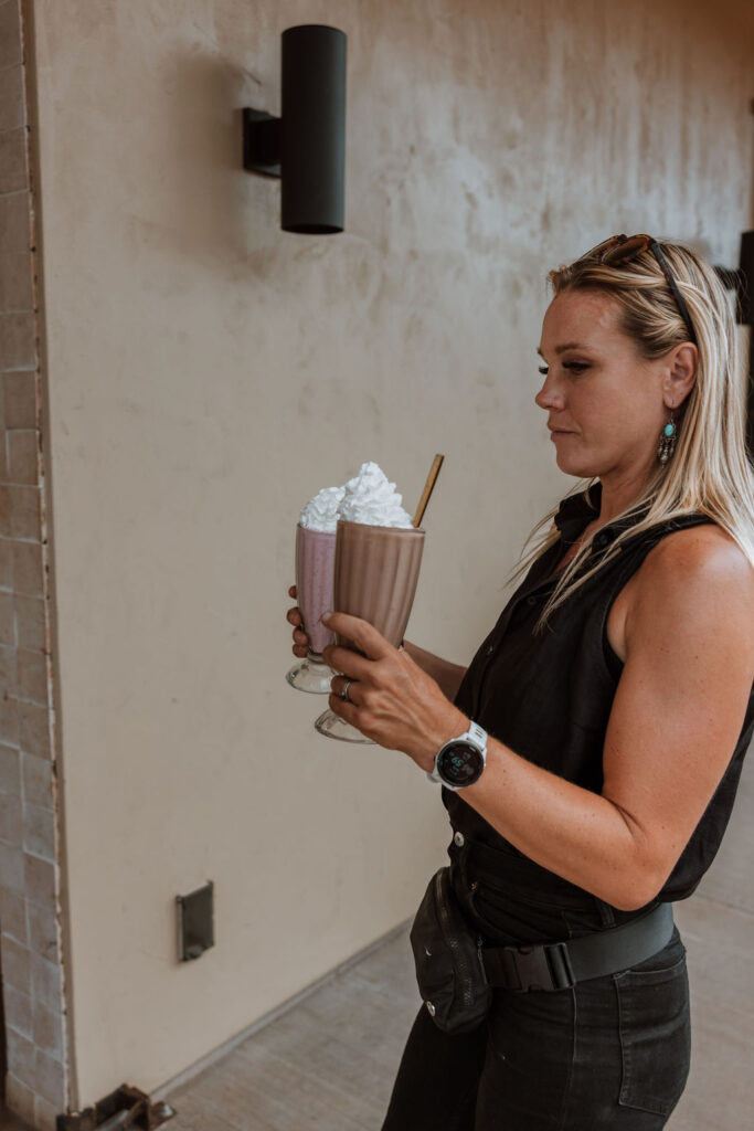 wedding coordinator carries milkshakes