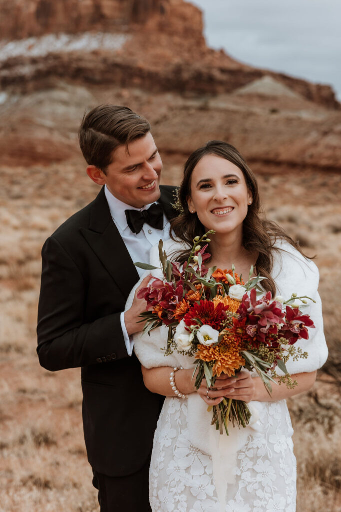 couple embraces at The Red Earth Venue wedding