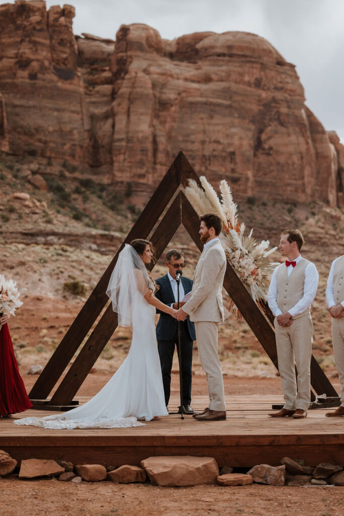 couple exchanges vows at The Red Earth Venue wedding