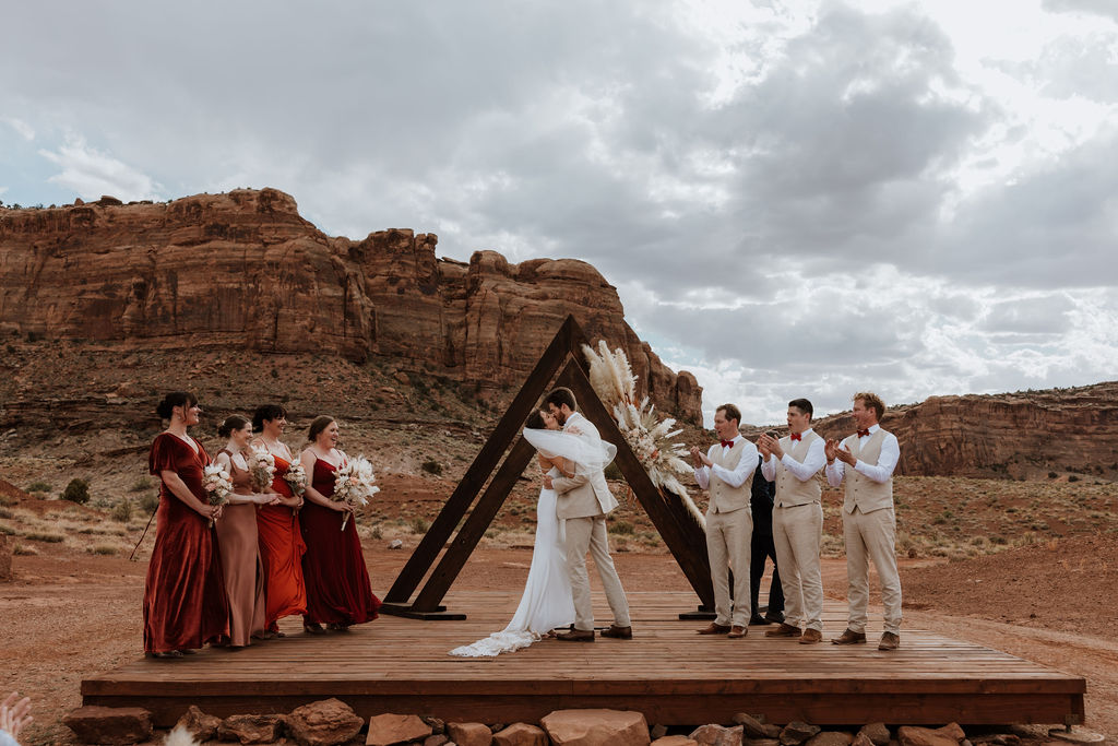 couple kisses at The Red Earth Venue wedding