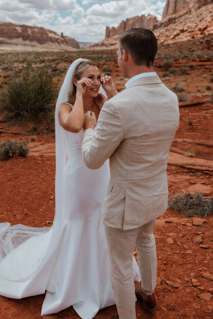 couple cries during first look at Moab elopement