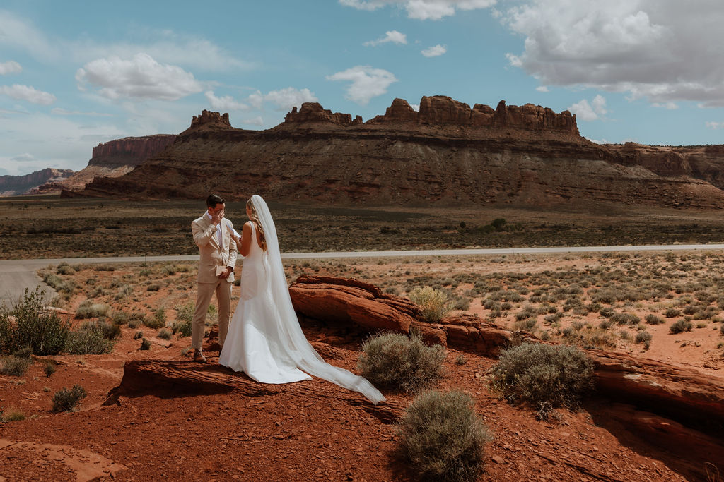 couple exchanges vows at Moab elopement 