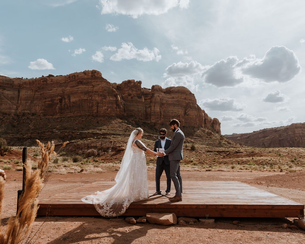 couple exchanges vows at Red Earth Venue wedding