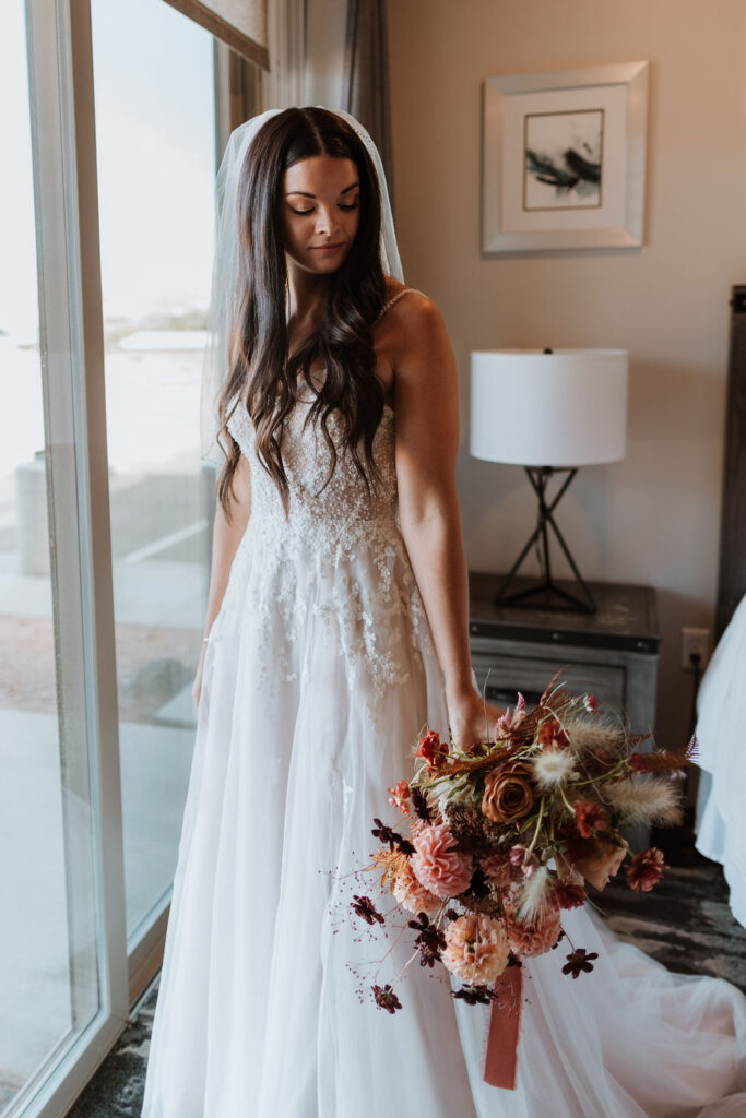 bridal portraits of bride holding wedding bouquet