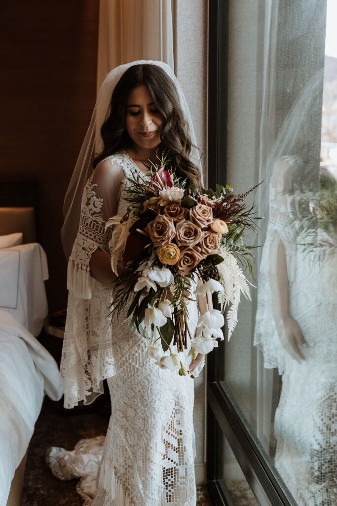 bride poses for wedding bridals captured by Moab wedding photographer 