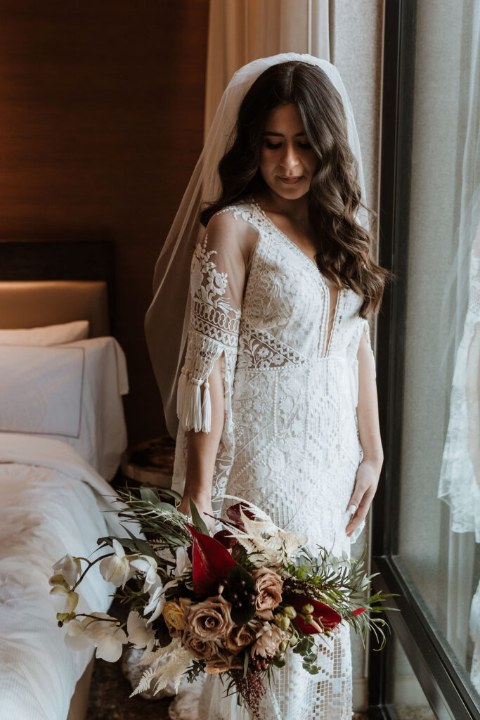 bride poses for wedding bridals captured by Moab wedding photographer 