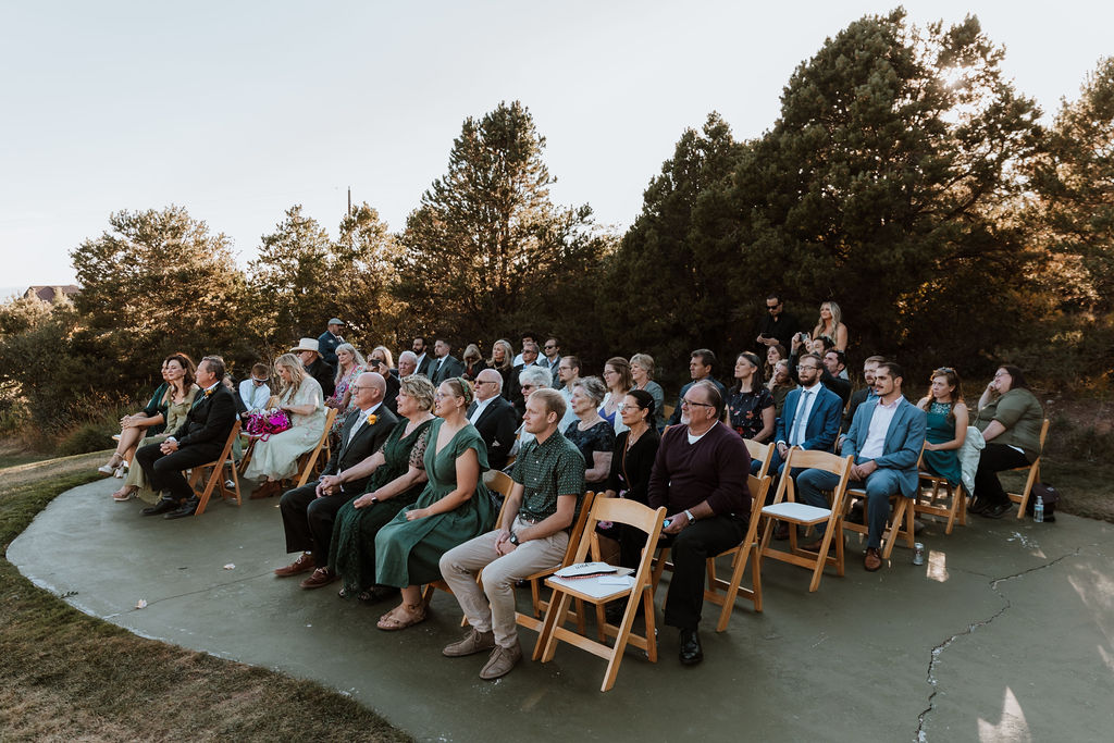 guests watch ceremony at Whispering Oaks Ranch 