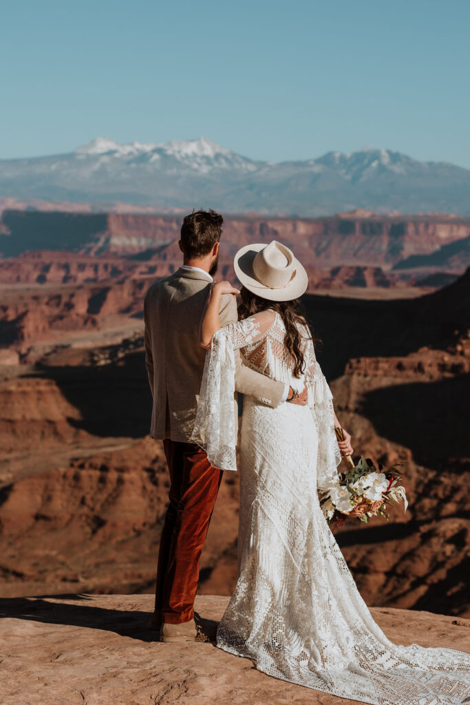 couple embraces at Canyonlands elopement