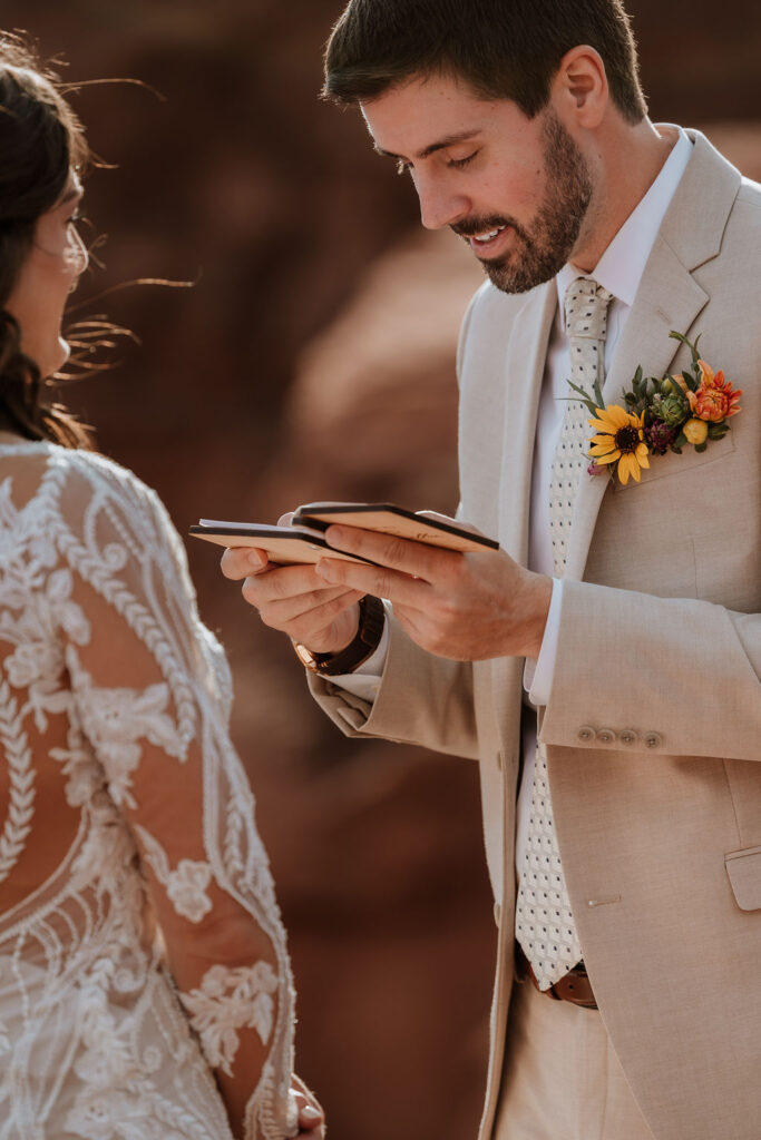 couple exchanges vows on overlook at Canyonlands elopement