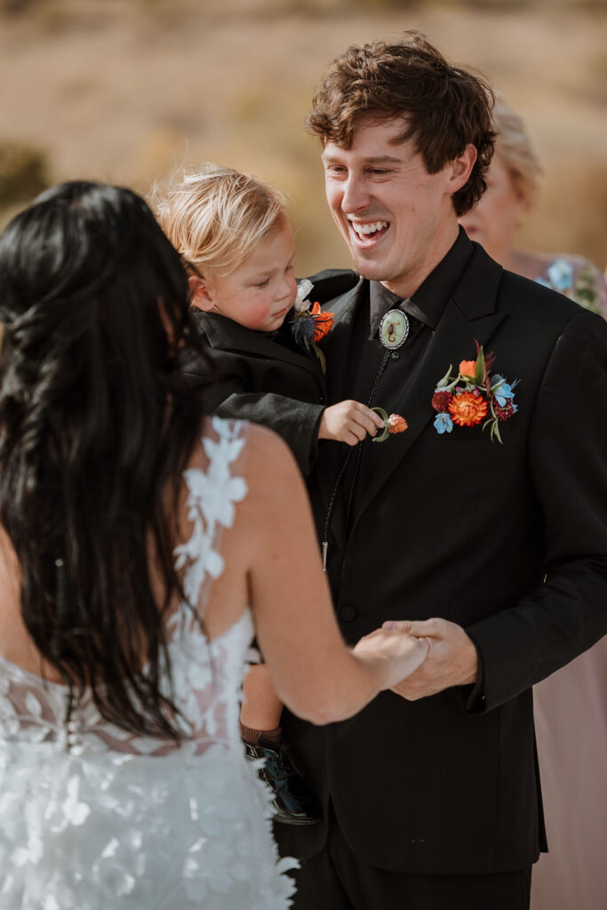 couple exchanges vows at The Red Earth Venue wedding