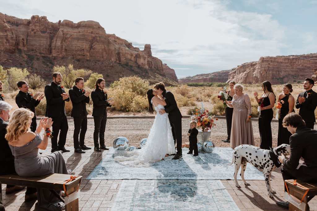 couple kisses at The Red Earth Venue wedding