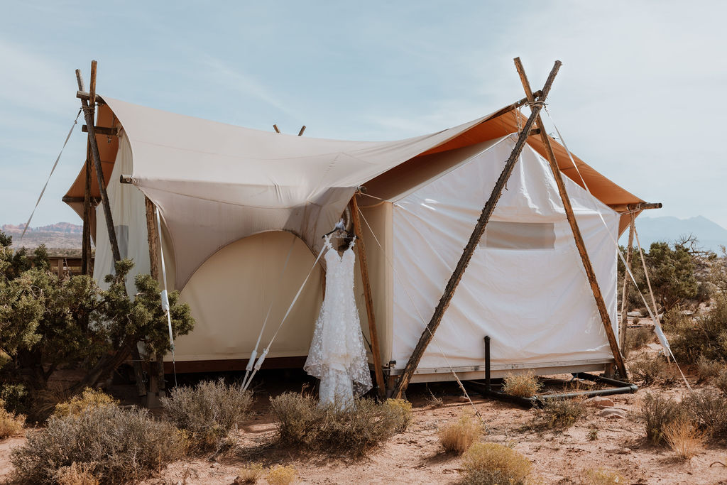 Under Canvas Moab wedding tent with dress