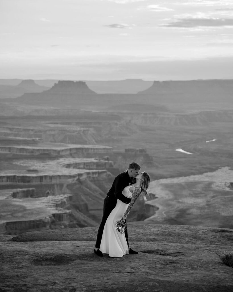 couple kisses at Canyonlands elopement