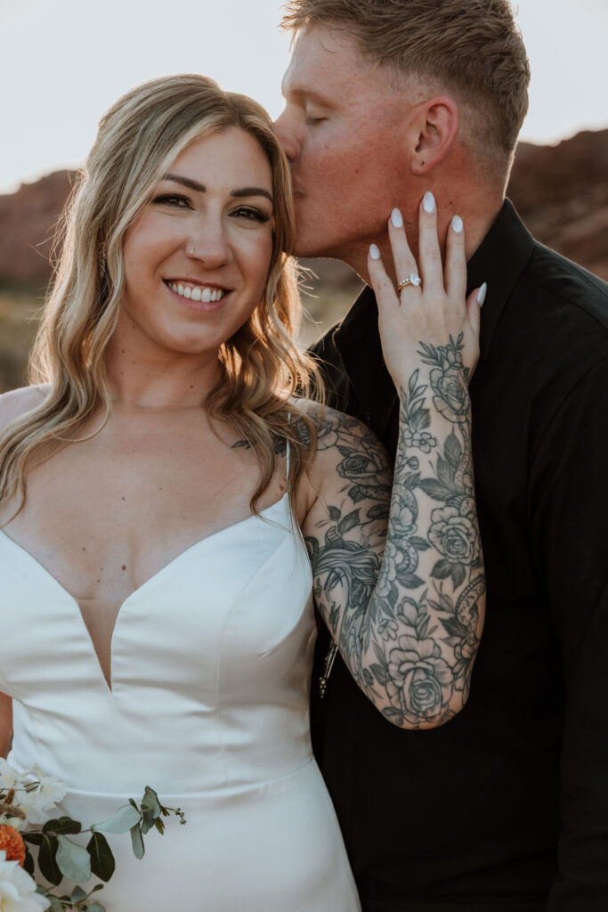 couple embraces during wedding bridals