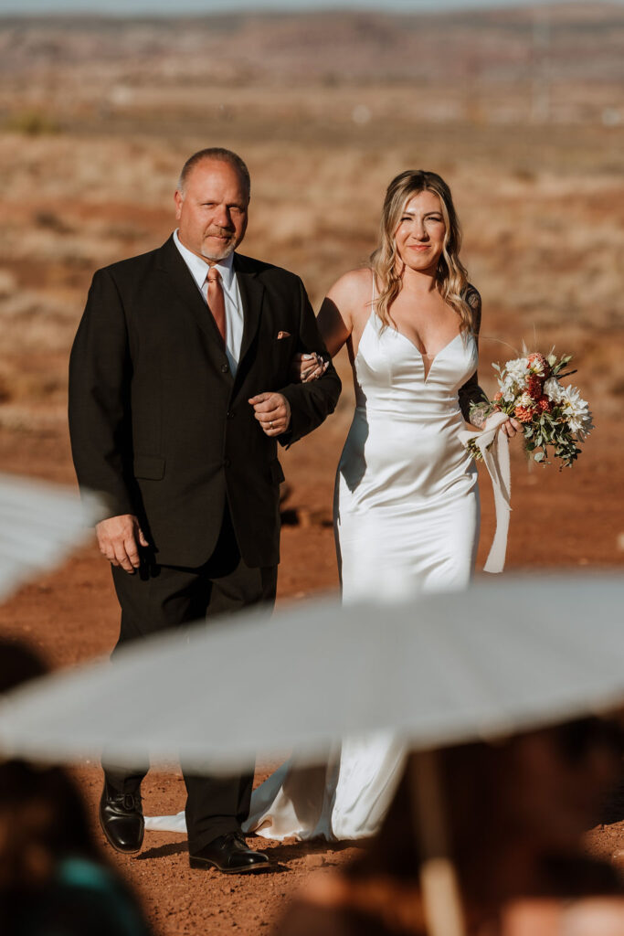 bride walks down aisle at The Red Earth Venue wedding