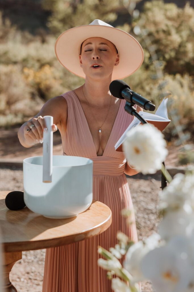 officiant leads sound bath during wedding ceremony