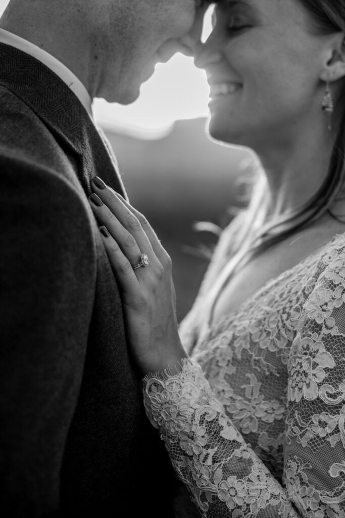 couple kisses during sunset Moab elopement