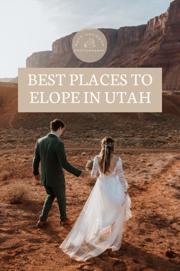 wedding couple walks down a valley at their castle valley elopement in moab utah