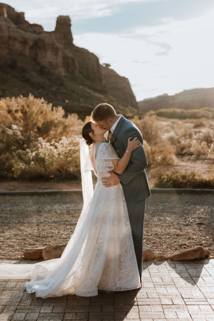 couple kisses at The Red Earth Venue wedding ceremony