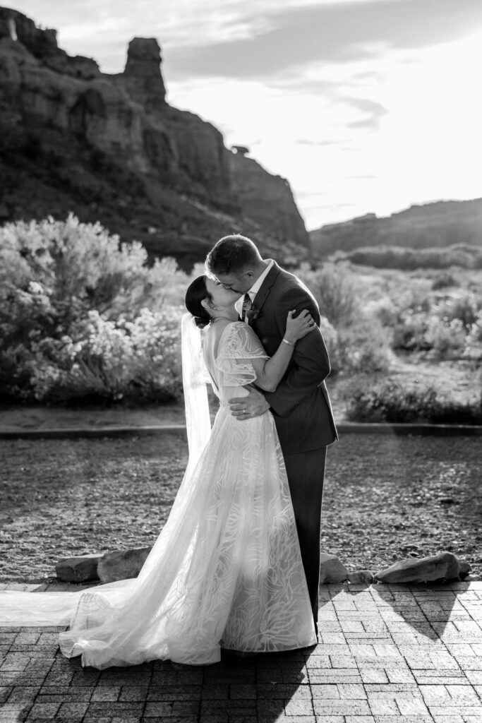 couple kisses at The Red Earth Venue wedding ceremony