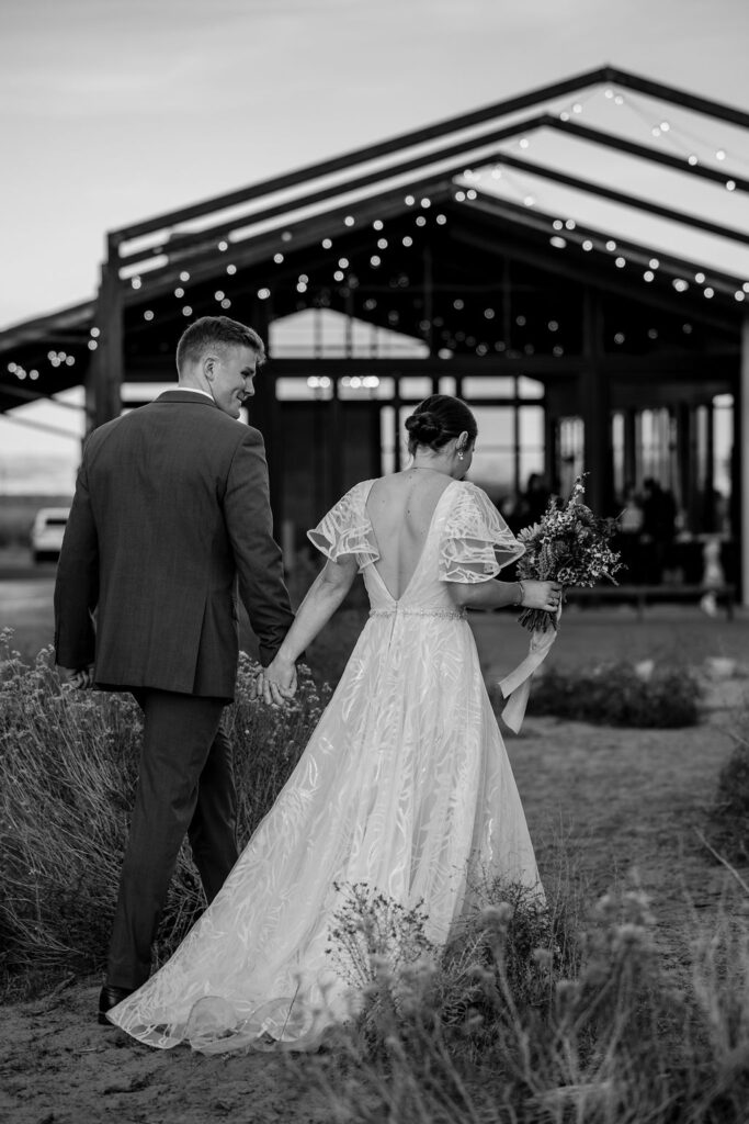 couple approaches The Red Earth Venue Moab 