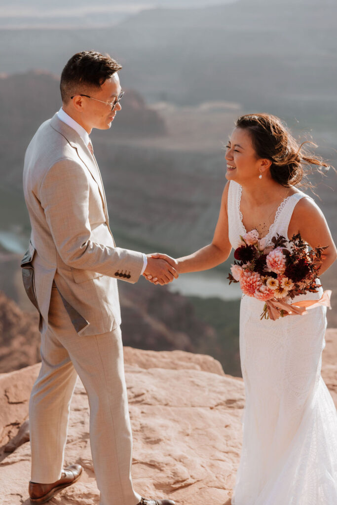 couple laughs together at Dead Horse Point elopement