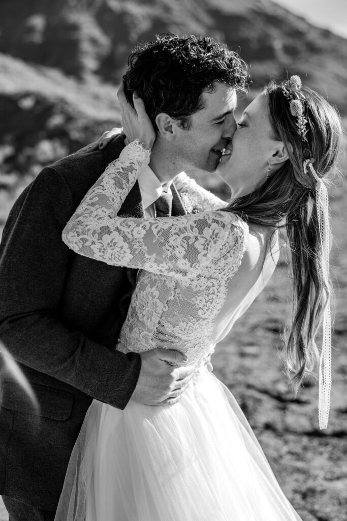 Couple kisses at their Castle Valley Utah Elopement