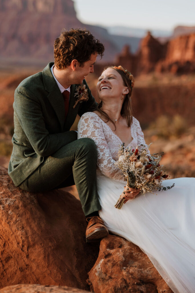 Couple looks at each other during couples photos at their elopement