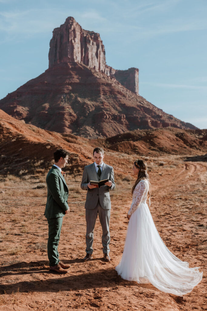 Couple takes part in their elopement ceremony in Castle Valley Utah